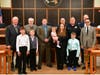 Officer Michael Thomsen with his family, Chief John Mitzak, Council President Tim Ring, Council Vice President Howard Norgalis, Councilman Michael Kirsch, Councilman Allen Kurdyla, and Councilman Filipe Pedroso.