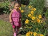 Two-year-old Alani Sophia Holmes known for her love of flowers.