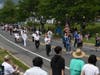 Members of the color guard and military veterans lead the parade down Old York Road.