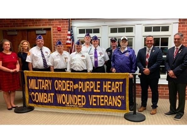 Committeewoman Catherine Payne, Committeewoman Samantha Hand, Hillsborough Purple Heart recipients, Mayor Robert Britting, Jr., and Committeeman Shawn Lipani.