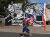 A mural on the side of a building at the corner of Nevius Street and Canal Street pays tribute to WWII hero John Basilone who was awarded the Congressional Medal of Honor and Navy Cross for his heroism and valor on the battlefield.