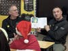 Officer Sean Devlin and Sergeant Dewitt Giles reading to middle school students at Rock Brook School.