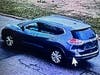 The suspect is described as a light-skinned or white man driving a dark grey Nissan Rogue with no visible license plate, tinted rear windows, chrome trim, and roof racks.