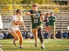 Emily Green, sophomore #19, seals off a defender to take a shot at the cage.