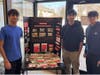 Krishay Patel, Guru Puduru, and Arjun Buch (Left to Right), distributing fire safety kits and leaving an easy-to-see poster to spread awareness at Kinnelon Public Library.