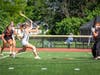 Charlotte Daniel, senior #12, reacts quickly to win the ground ball and rip a shot past the goalie to score.