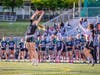 Ana Fukushima, senior #36, rises up to make the catch.
