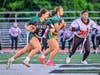 Melanie Tafur, sophomore #2, scrambles upfield for Ridge. Tafur rushed for 130 yards and four touchdowns on the night.