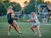 Lexi Hansen, freshman #29, breaks through Bernards' defense to take a shot at the cage.