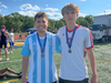 Manville High School seniors Damian Smutek (left) and Gabriel Zala (right) display their medals at the NJSIAA Group 1 State Championships. Smutek and Zala capped off their historic high school running careers by placing 4th and 5th in the 800-meter event.