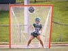 Goalie Romey Gussin, sophomore #22, makes a save.