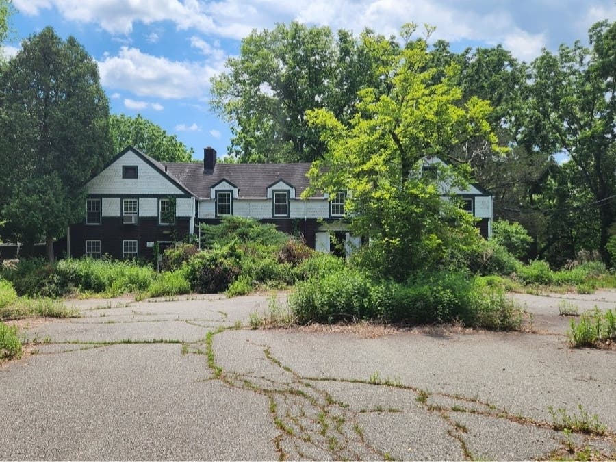Bernards Township residents urged officials to reject a redevelopment designation for the former Lord Stirling School property, pointing to poor upkeep by the owner.