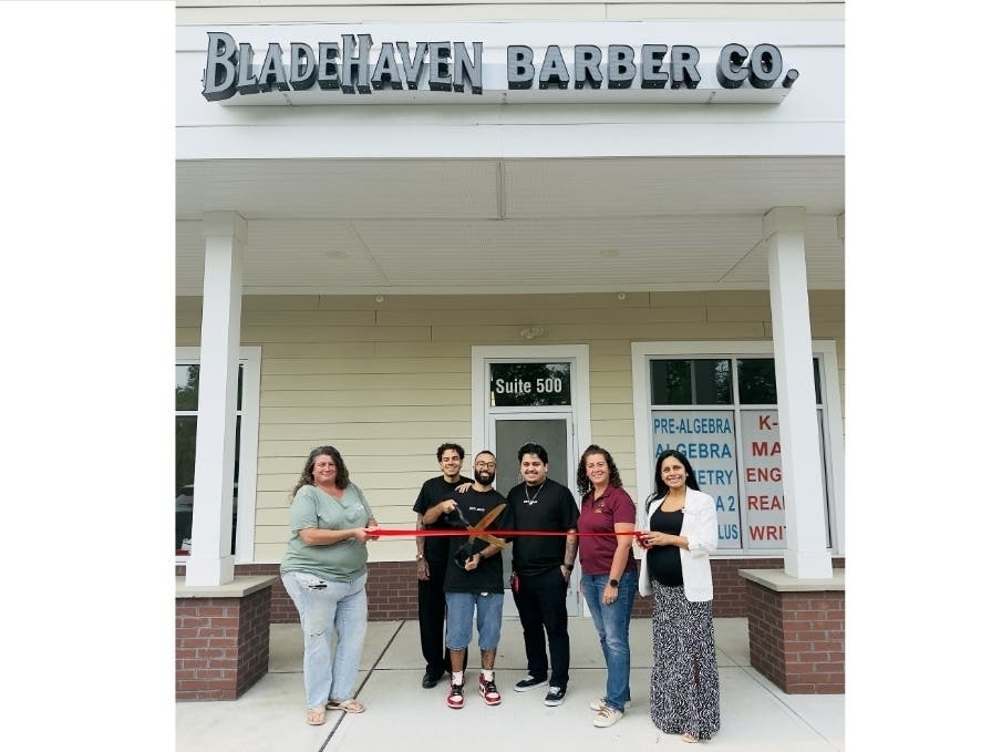 Hillsborough Mayor Catherine Payne, Committeewoman Jill Gomez, Norz Hill Farm Owner Debbie Norz and Blade Haven officials.
