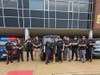 From left to right: Gerardo Toledo, Katelyn Kwiecinski, Erick Colonnello, Dewitt Giles, Piper Ford, Principal Heather Pino-Beattie, Delio Coutinho, Jesse Peterson,  Jason Larsen, Adam Verducci, Thomas Connell, Joseph Sles.