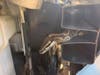A three-foot python trapped inside the grill of a car was removed by Franklin Township Police on Monday.