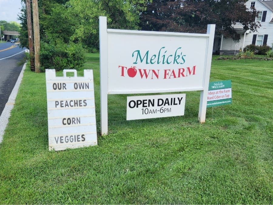 A controversial self-storage facility looking to build on the long-vacant Tectonic building in Bridgewater has revised its plan to keep — instead of demolish — Melick's Farm Stand.