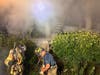 Montgomery residents were awakened by smoke and fire inside their home overnight on Monday.
