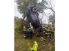Two people were rescued from an SUV after it crashed off Interstate 78 and became stuck in a tree on Sunday, first responders said.