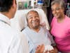 Senior Couple Talking with doctor