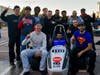 UIC’s chapter of the Society of Automotive Engineers (SAE) Formula team celebrate its first-place win on Oct. 29 during Lawrence Technological University’s annual autumn Grand Prix in Southfield, Michigan.