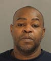 George R. Davis, 50, was driving a car with two female passengers at the bank, according to police.