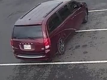 Witnesses told officers that they saw a maroon, Dodge minivan circling the parking lot several times before stopping.