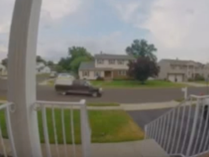 VIDEO: Watch as the truck drives past a home, then hear the loud bang as it crashes into a parked vehicle.