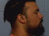 Malik Williams, 22, charged with capital murder after death of three-month-old child hospitalized with multiple fractures.