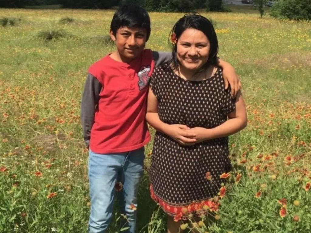 Hilda Ramirez, who sought refuge after escaping violence in Guatemala for the benefit of her son, (right) was hit with a $303,620 fine from DHS.