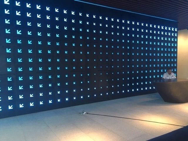 Lobby at the new SXSW headquarters building at 1400 Lavaca St. wordlessly denotes its anchor tenant, with the familiar arrow icon.