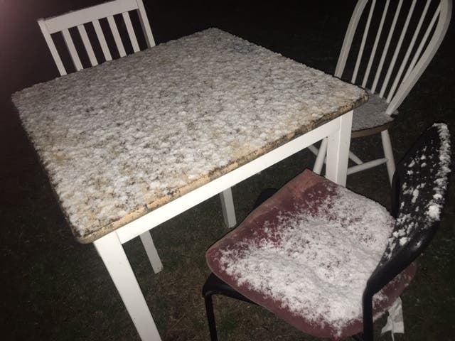 The outdoor lounge area at Austin Patch headquarters were covered with snow overnight.