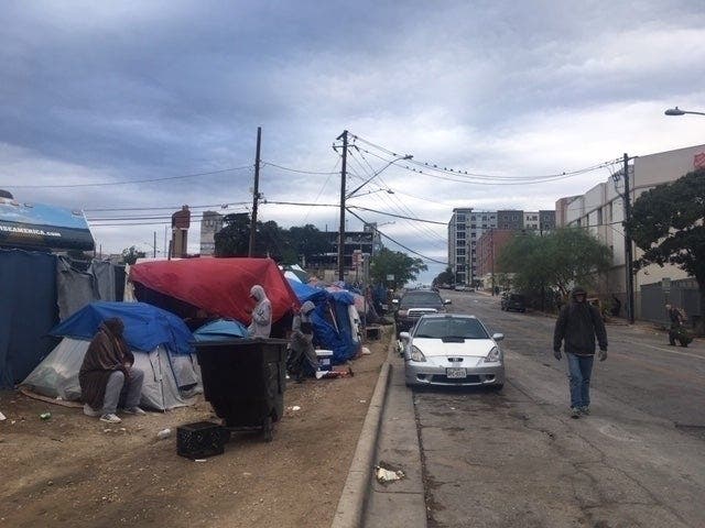A row of tents sprouted up along Neches Street after the city relaxed its rules before it was dismantled last November.