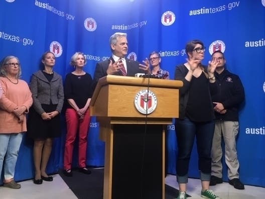 Flanked by county, city and health officials, Austin Mayor Steve Adler announces the cancellation of SXSW over the growing coronavirus threat.