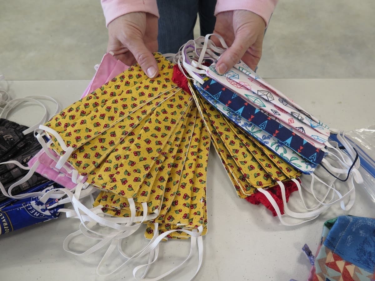 Led by the 'Mask Brigade,' plattoons of seamstresses that include the 'COVID Rangers' churn out masks for 1st responders and medical workers.