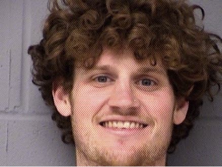 Cell phone footage widely shared on social media shows officials pushed in the water as he urged physical distancing guidelines adherence.