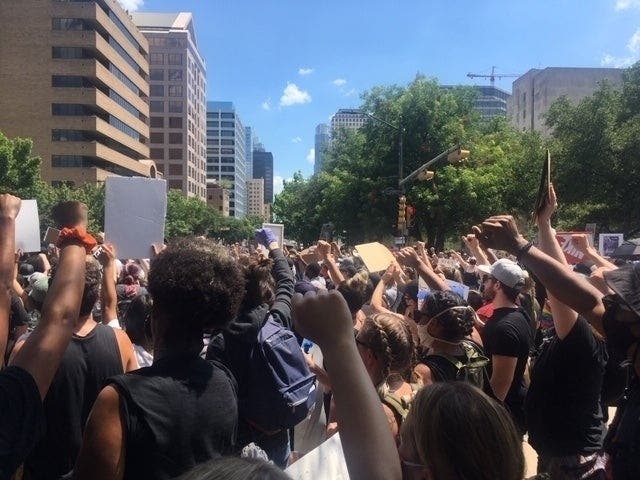 Thousands of protesters decrying police brutality marched through downtown streets calling for police reform on Sunday, June 7.