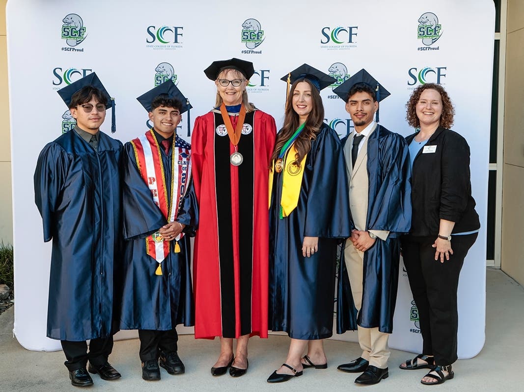 Photo caption: SCF graduates Renber Hernandez-Larios and Marcelo Chinga Quevedo, Kristen L. Anderson, Ph.D., program director, TRIO SSS, SCF graduates Jana Andresia Maynard and Armando Garfias-Mena, and Leah Nusman, coordinator, TRIO SSS, SCF.