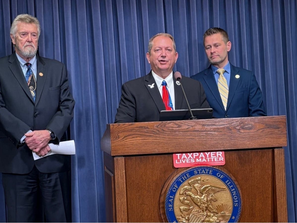 Rep. Tom Weber speaks alongside Reps. Steve Reick and Joe Sosnowski.