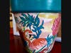 "Flying Flamingos." Olivia shows her art class how to decorate terra cotta flower pots in time for Spring and "lose those winter blues."
