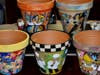 Terra Cotta Flower Pots become very special with colorful images. Great gifts!