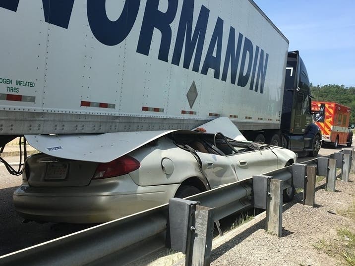 A man escaped this crash with minor injuries. 