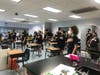 Eighth grade enjoying their new homeroom - the Science Lab!