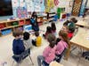 Preschool students get excited when Social Emotional Learning puppets visit classroom.