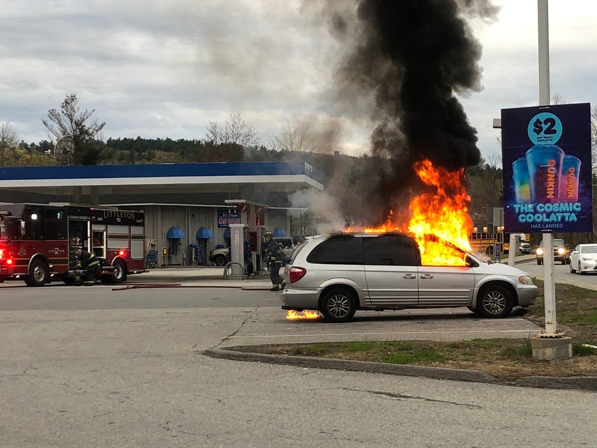 A van caught fire in a gas station parking lot Wednesday.