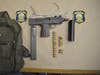 Officers found an Uzi-type weapon in Holder's Somerville home, police said.