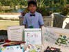 Andrew Yum, Wellan Montessori 5th grader, showcases his award-winning and eco-friendly “Earth Bags” at the Acton Children’s Business Fair.