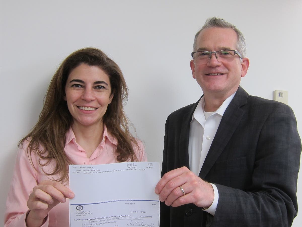 Northfield Township Supervisor Shiva Mohsenzadeh presented a check to Richard Van Hees, Director of Major and Planned Giving & Associate Foundation Director of Oakton Community College.