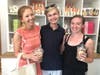 (L-R) Helen Phillips, Zac Mathias and Katherine Phillips attend the grand opening of Chocoylatte Gourmet in Cos Cob.
