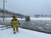 Firefighters rescued two people from a submerged truck in the water near Cummings Park during a snow storm, Stamford fire officials said.