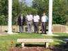 Lenny Hunter, Alex Hargrove, Don O'Connell and John Driscoll​, four members of the VFW Post 6933 Color Guard, raised the flag on the Town Hall flagpole during a ceremony Monday.